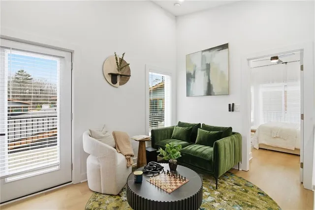 a living room with furniture and a window