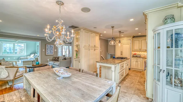 a bathroom with a granite countertop toilet a sink and a bathtub