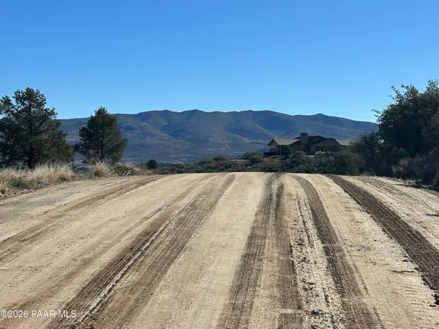 a view of balcony with a yard