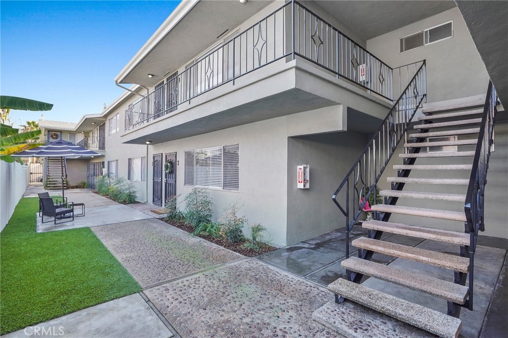 1106 Pacific Avenue Long Beach, CA 90813 - Photo 4 of 13 a view of a house with a yard
