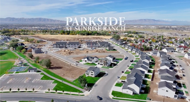 2559 West Aurora Avenue, Unit 292 Mapleton, UT 84664 - Photo 1 of 9 Aerial perspective of suburban area featuring mountains