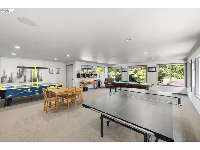 a view of house with outdoor space and car parked