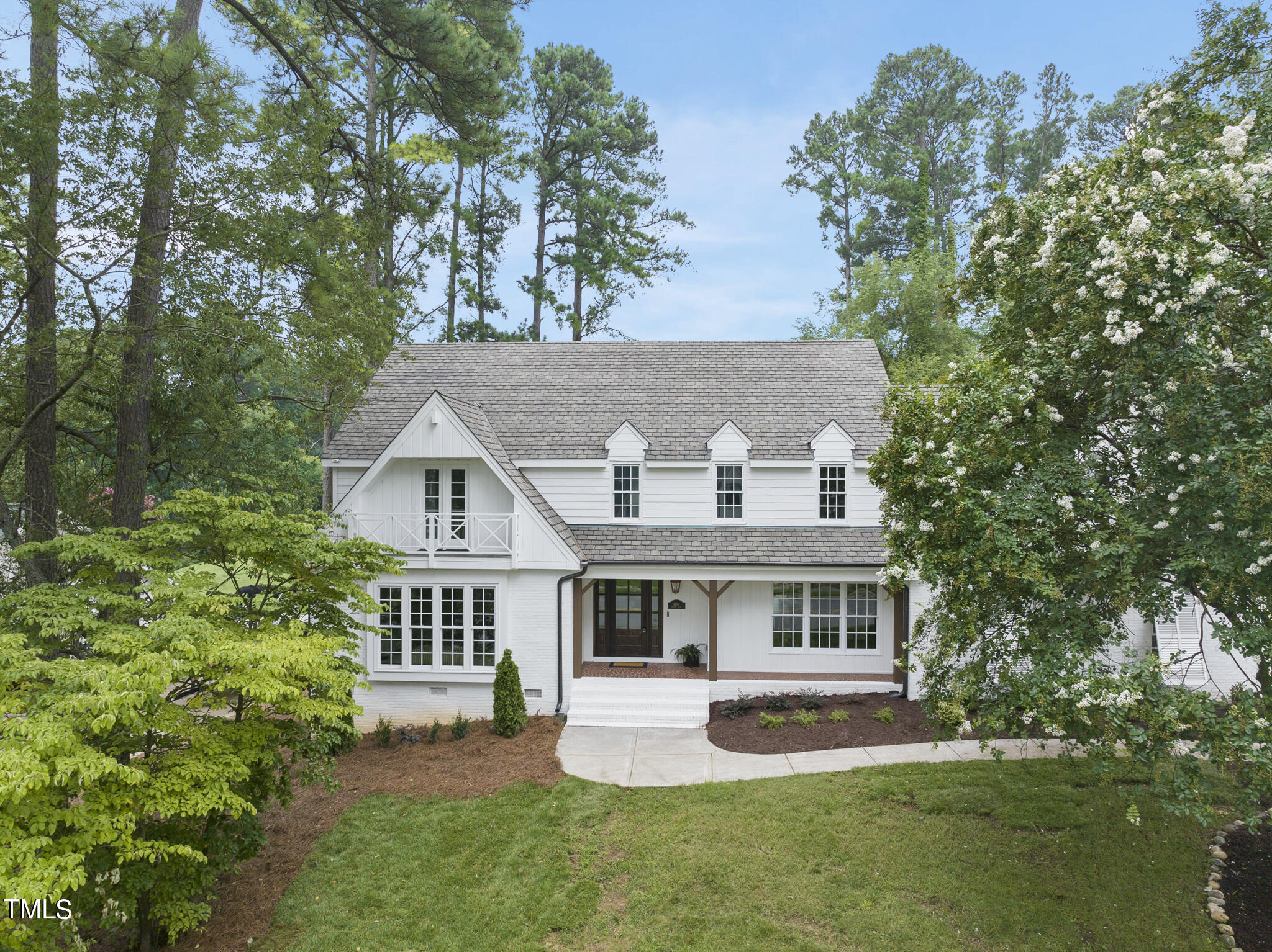 1704 Hunting Ridge Road Raleigh, NC 27615 - Photo 1 of 46 an aerial view of house with yard and green space
