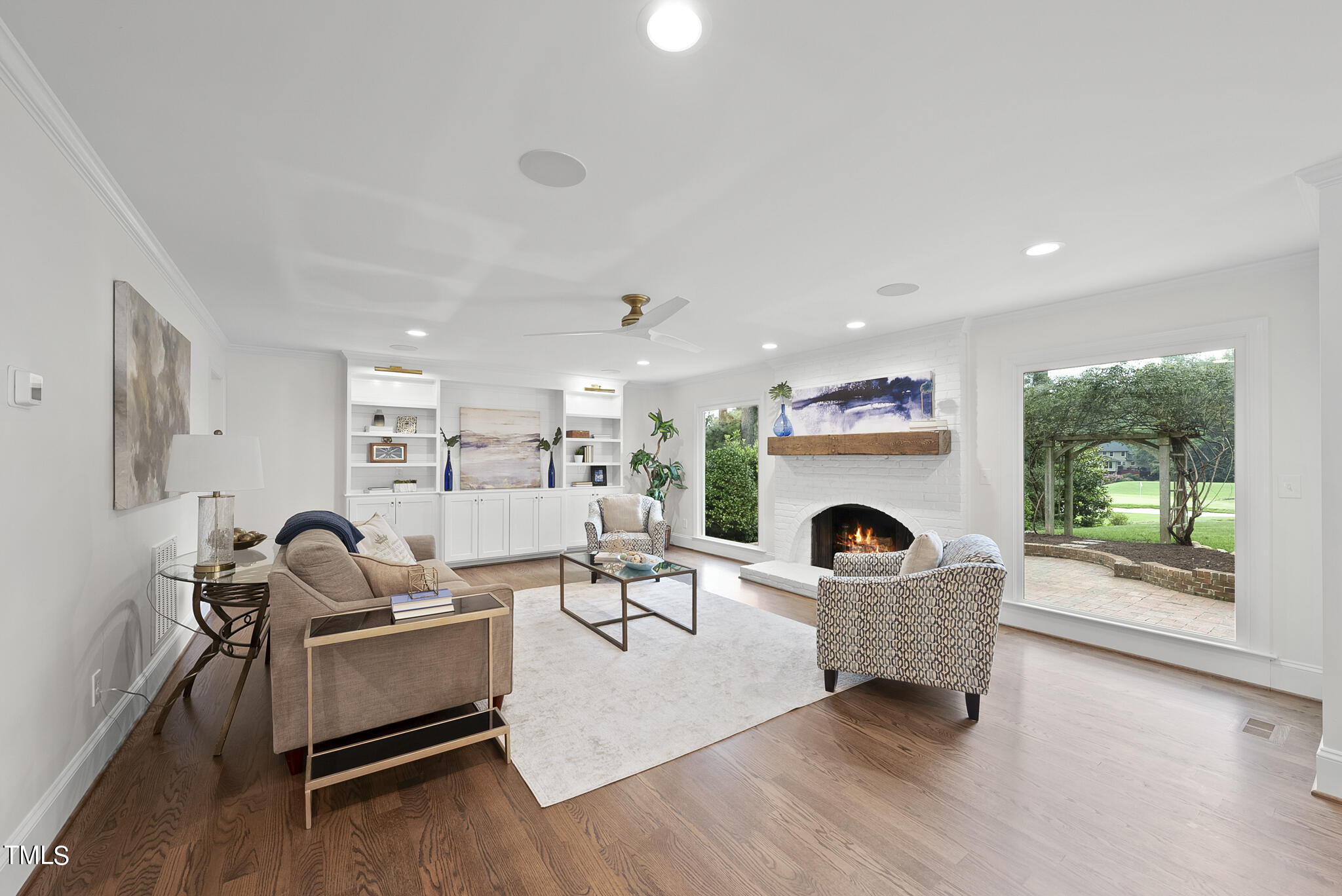 1704 Hunting Ridge Road Raleigh, NC 27615 - Photo 11 of 46 a living room with furniture and a fireplace