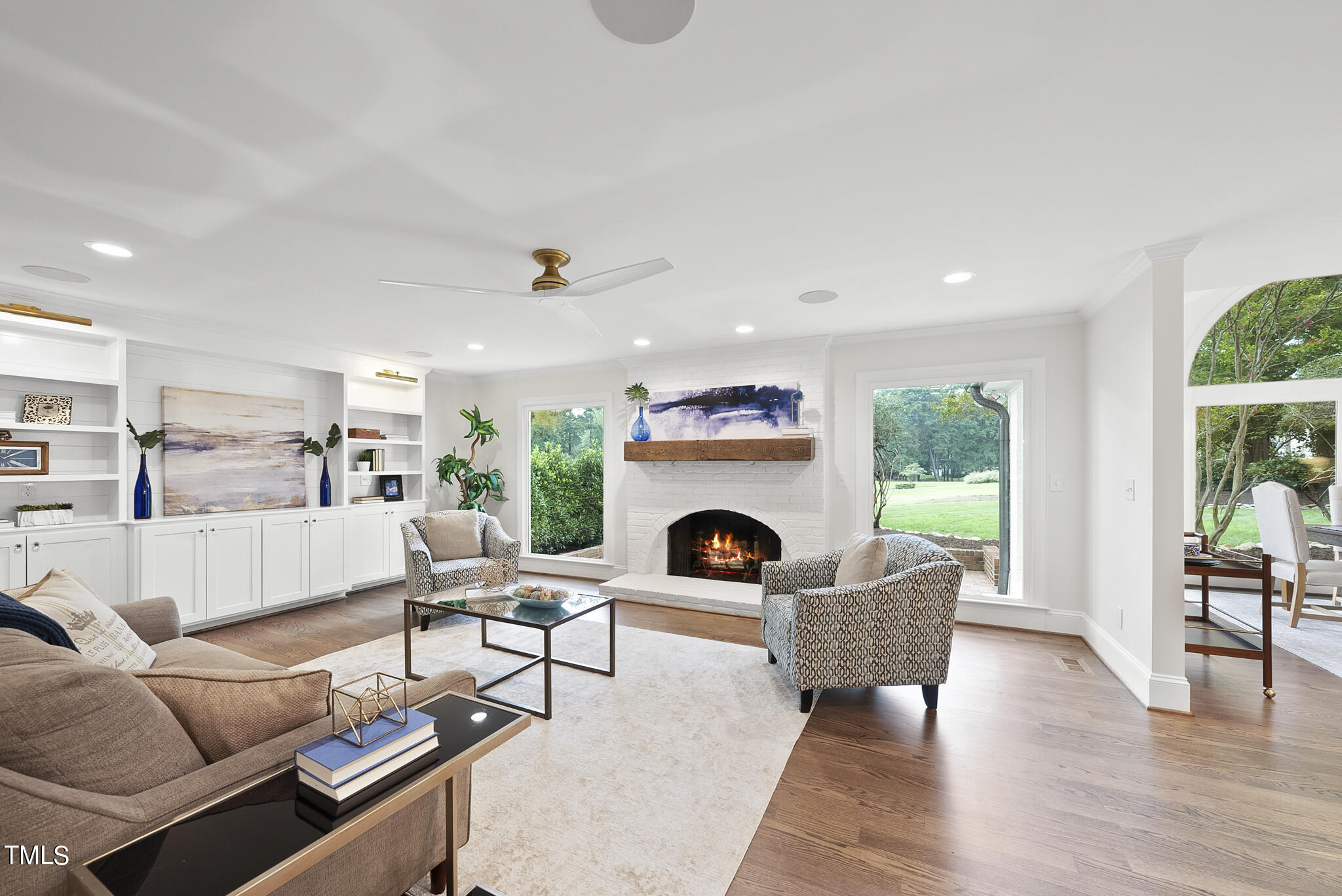 1704 Hunting Ridge Road Raleigh, NC 27615 - Photo 12 of 46 a living room with furniture and a fireplace