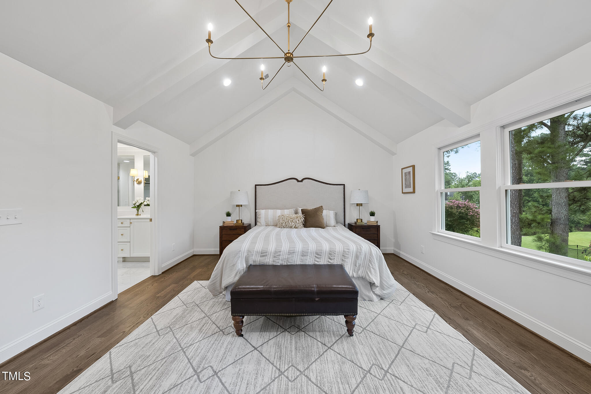 1704 Hunting Ridge Road Raleigh, NC 27615 - Photo 28 of 46 a bedroom with a bed and a large window