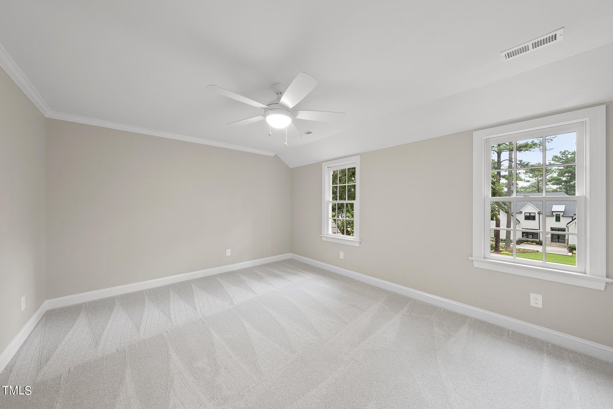 1704 Hunting Ridge Road Raleigh, NC 27615 - Photo 33 of 46 a view of an empty room with a window