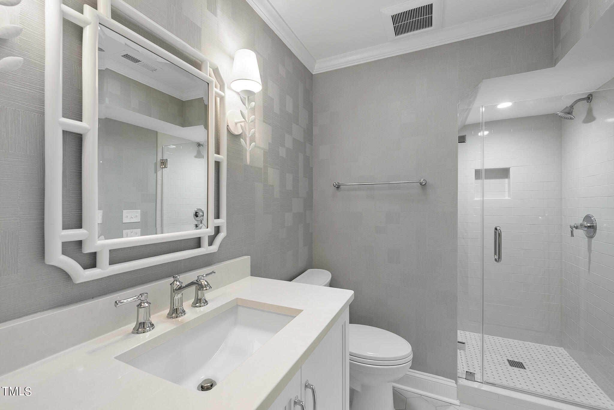 1704 Hunting Ridge Road Raleigh, NC 27615 - Photo 39 of 46 a bathroom with a sink toilet and shower