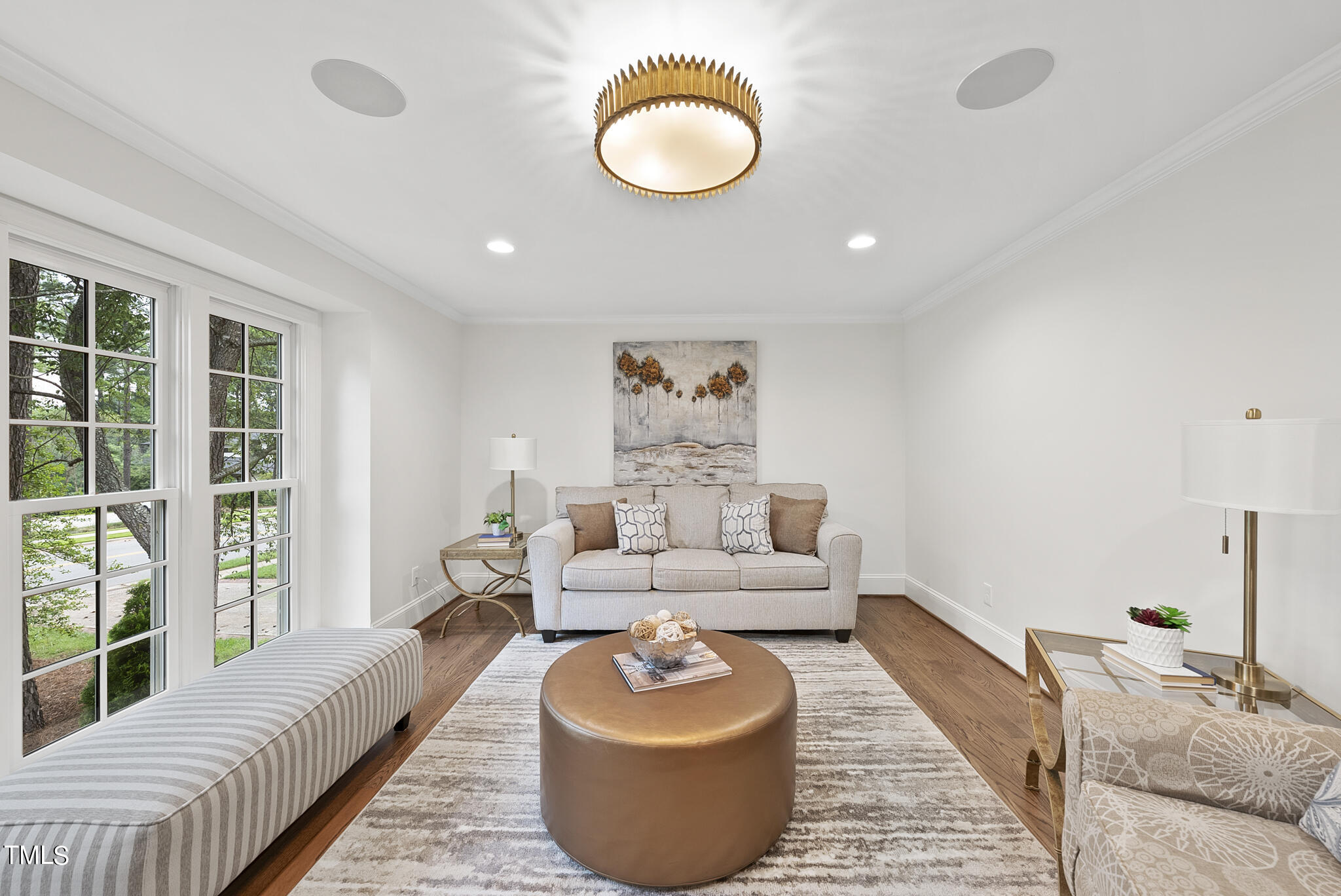 1704 Hunting Ridge Road Raleigh, NC 27615 - Photo 6 of 46 a living room with furniture and a large window