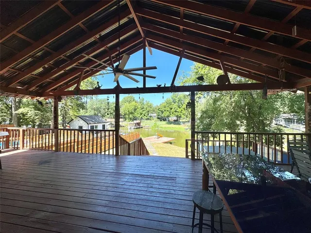 a view of a roof deck with wooden floor