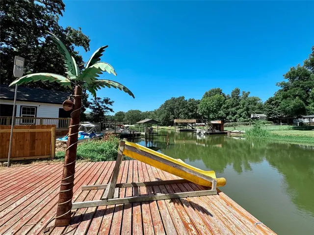 a view of swimming pool with a lake view