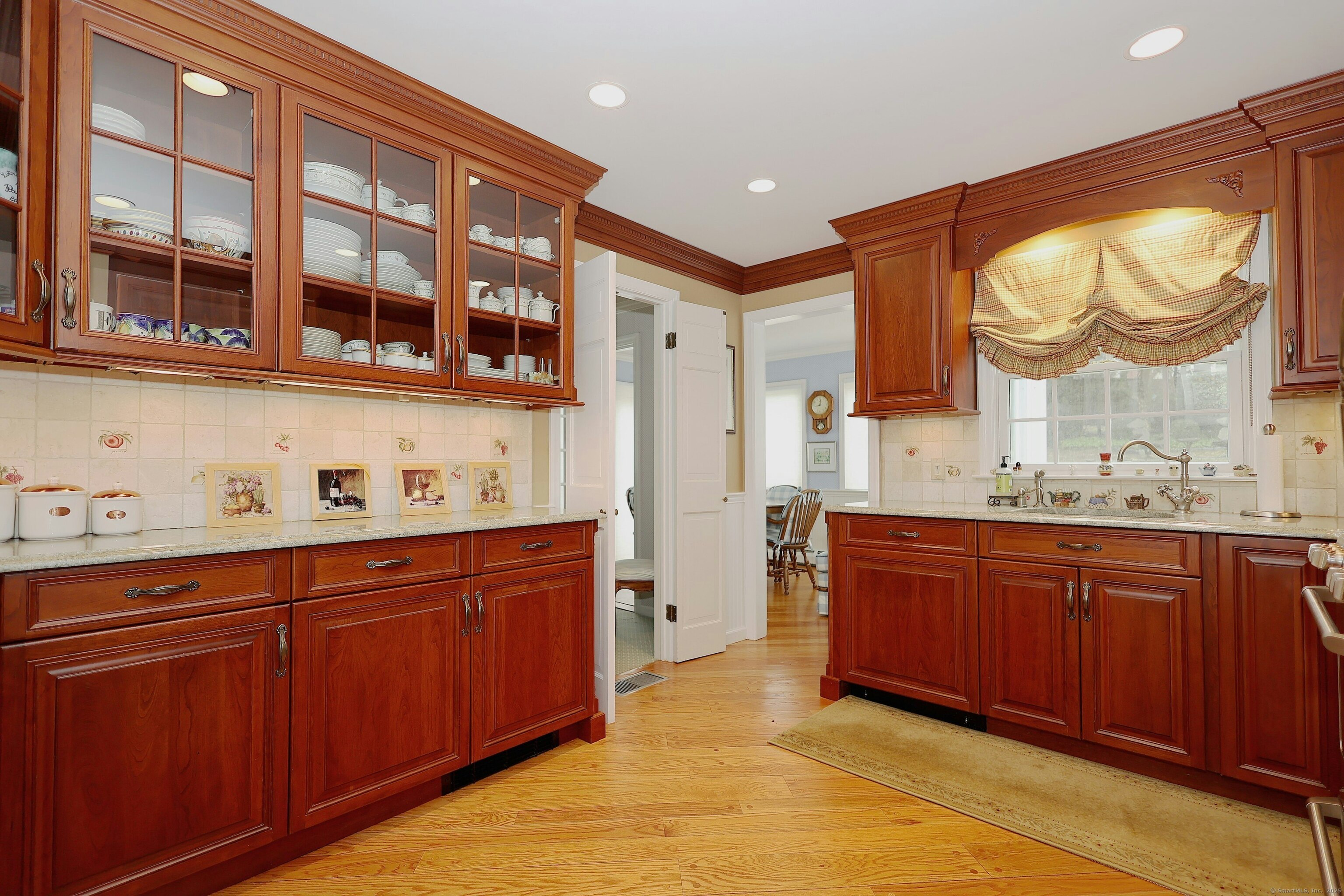 463 North Salem Road Ridgefield, CT 06877 - Photo 13 of 40 a spacious bathroom with a granite countertop double vanity sink and a mirror
