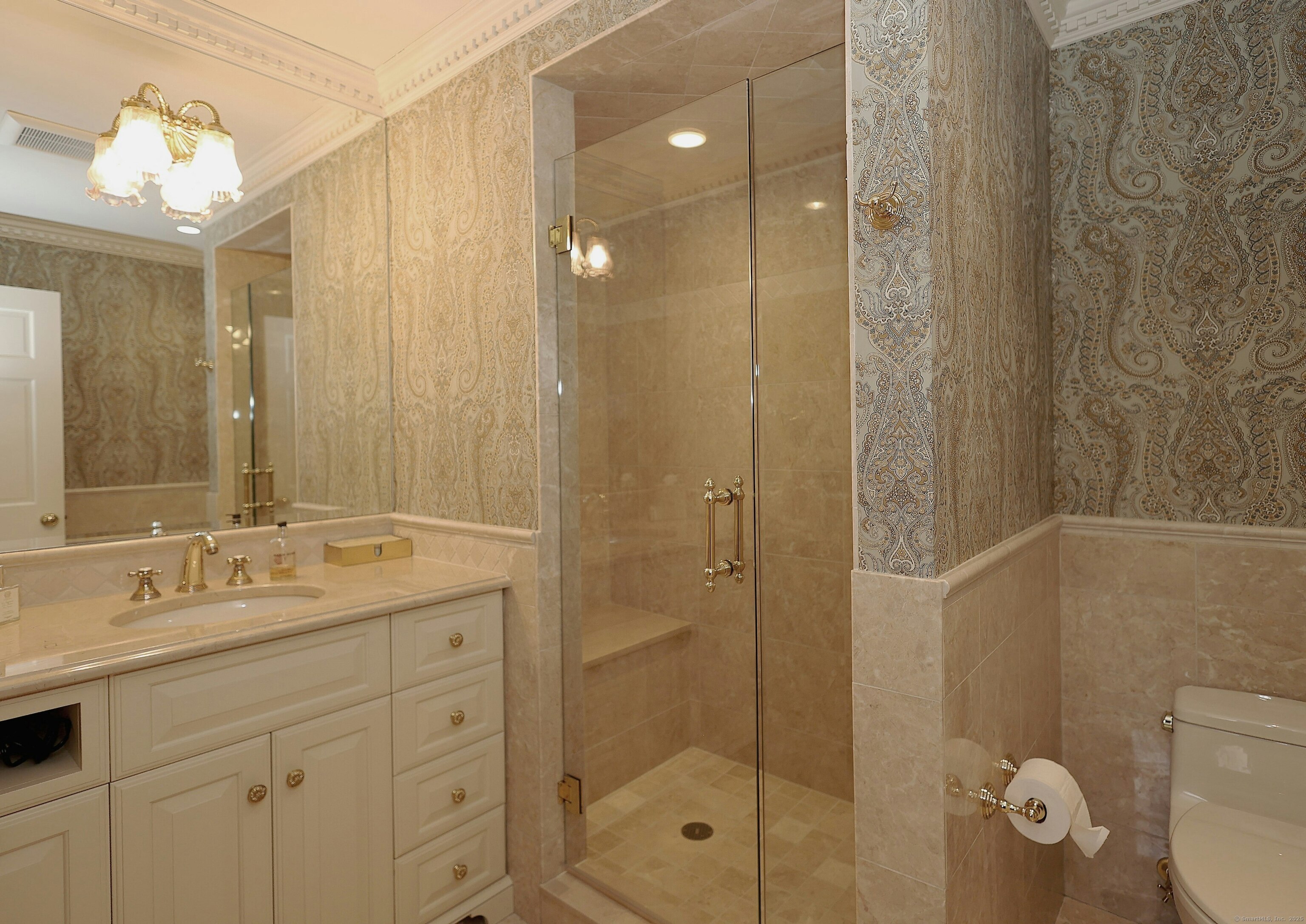 463 North Salem Road Ridgefield, CT 06877 - Photo 27 of 40 a bathroom with a shower sink vanity and mirror