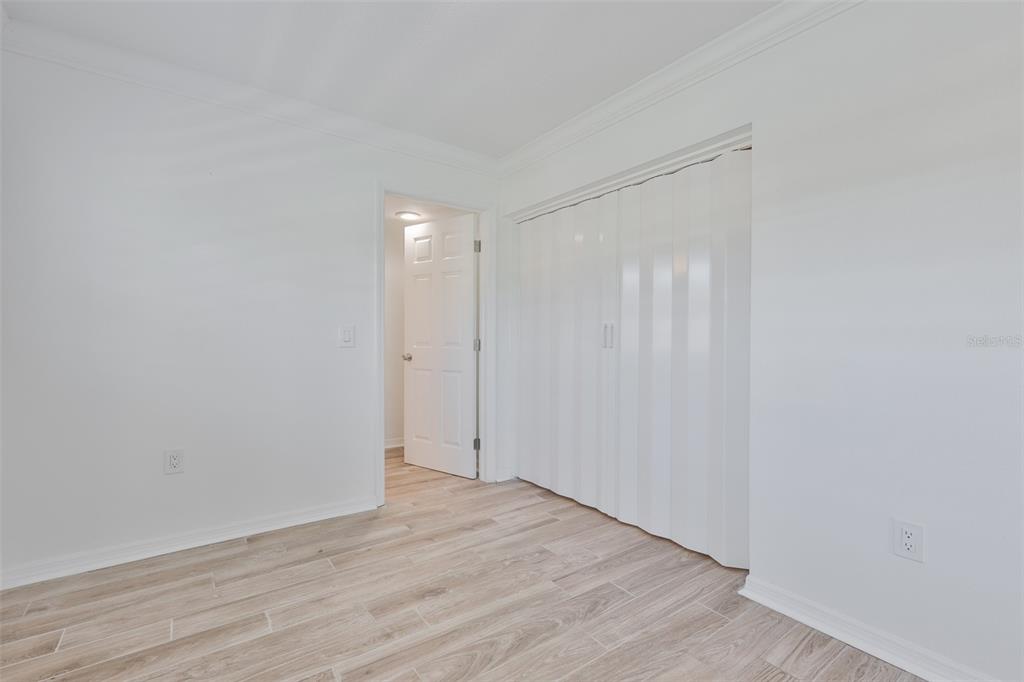 4736 Jasper Drive, Unit 103 New Port Richey, FL 34652 - Photo 29 of 41 a view of an empty room