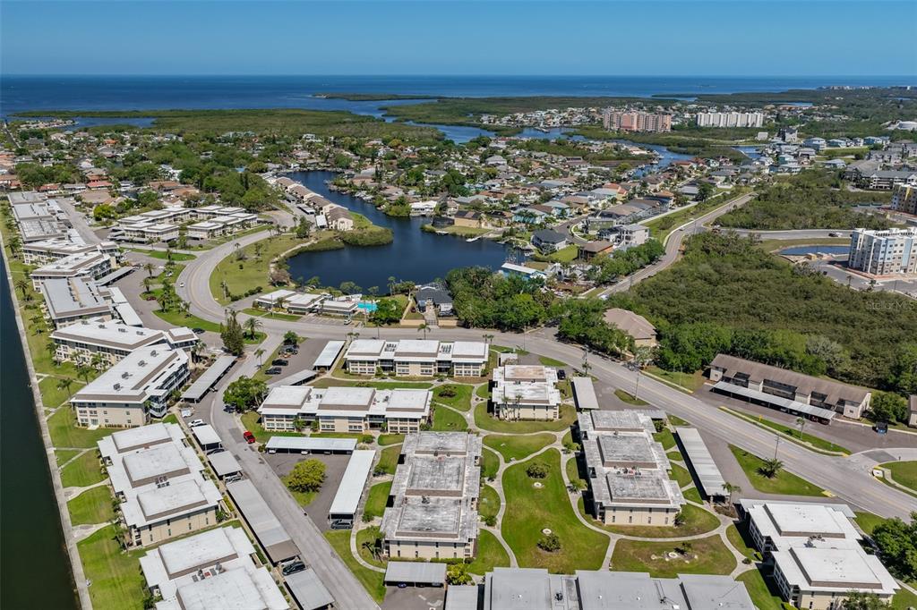 4736 Jasper Drive, Unit 103 New Port Richey, FL 34652 - Photo 36 of 41 an aerial view of residential houses with outdoor space