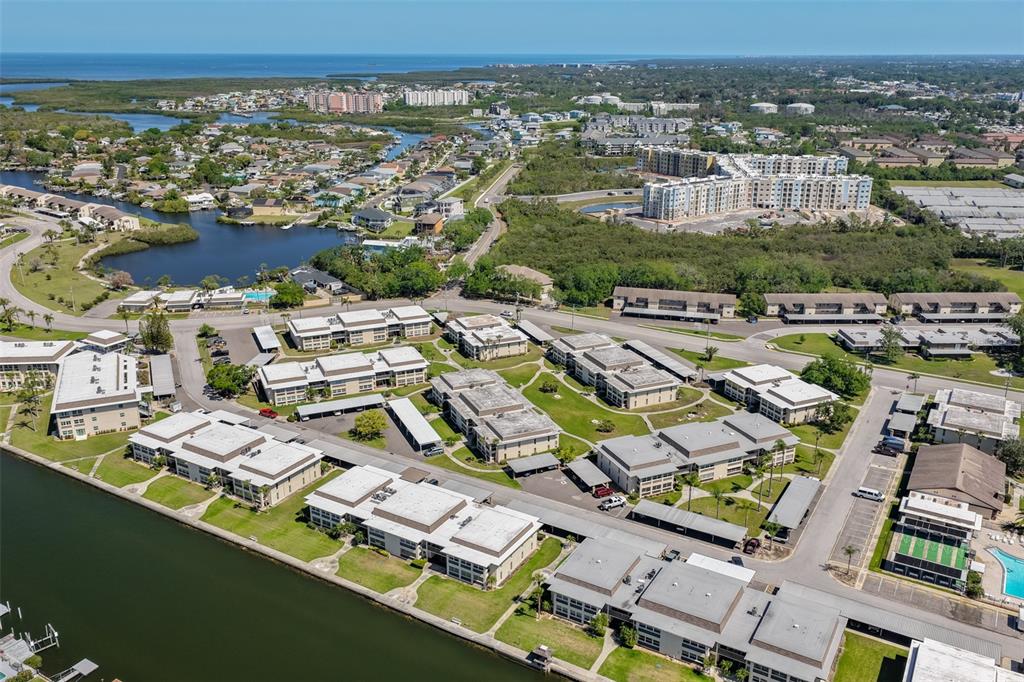4736 Jasper Drive, Unit 103 New Port Richey, FL 34652 - Photo 38 of 41 an aerial view of residential houses with outdoor space