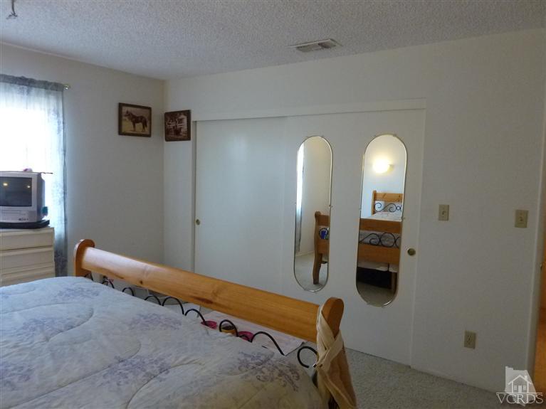 4593 Adam Road Simi Valley, CA 93063 - Photo 11 of 27 a view of lobby with mirror