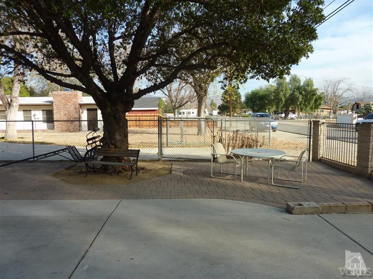 4593 Adam Road Simi Valley, CA 93063 - Photo 24 of 27 a view of a chairs and tables in the patio