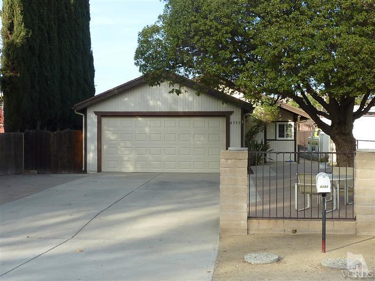 4593 Adam Road Simi Valley, CA 93063 - Photo 27 of 27 a front view of a house with garage
