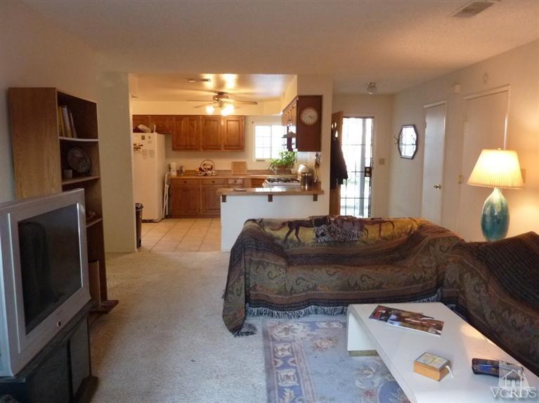 4593 Adam Road Simi Valley, CA 93063 - Photo 9 of 27 a living room with furniture and a flat screen tv
