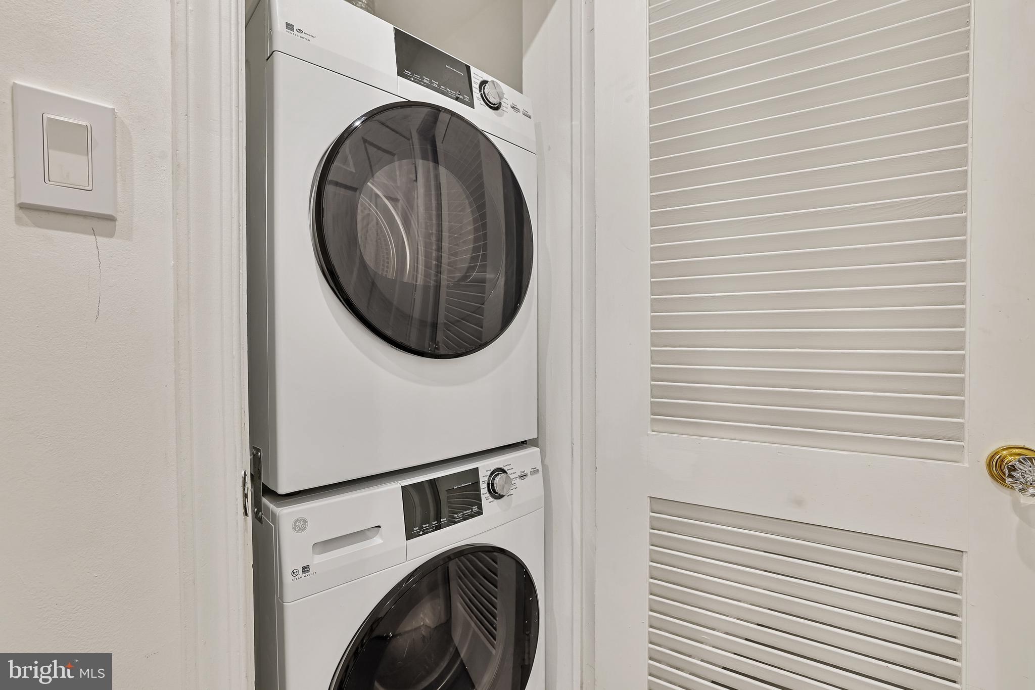 1233 Potomac Street Northwest Washington, DC 20007 - Photo 16 of 26 a utility room with dryer and washer