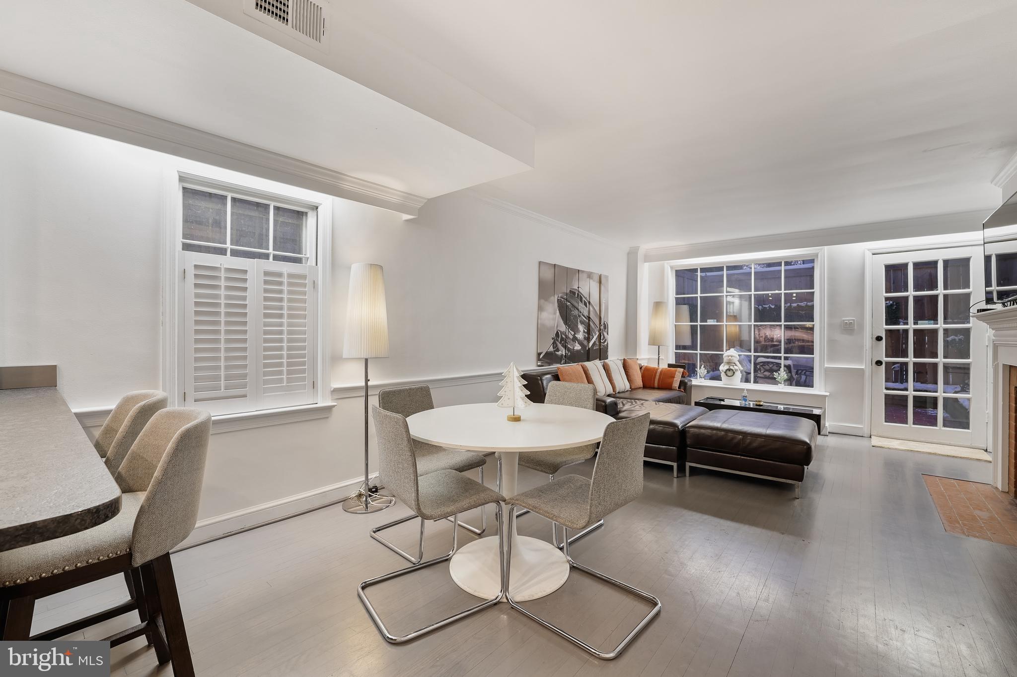 1233 Potomac Street Northwest Washington, DC 20007 - Photo 6 of 26 a view of a livingroom with furniture and window