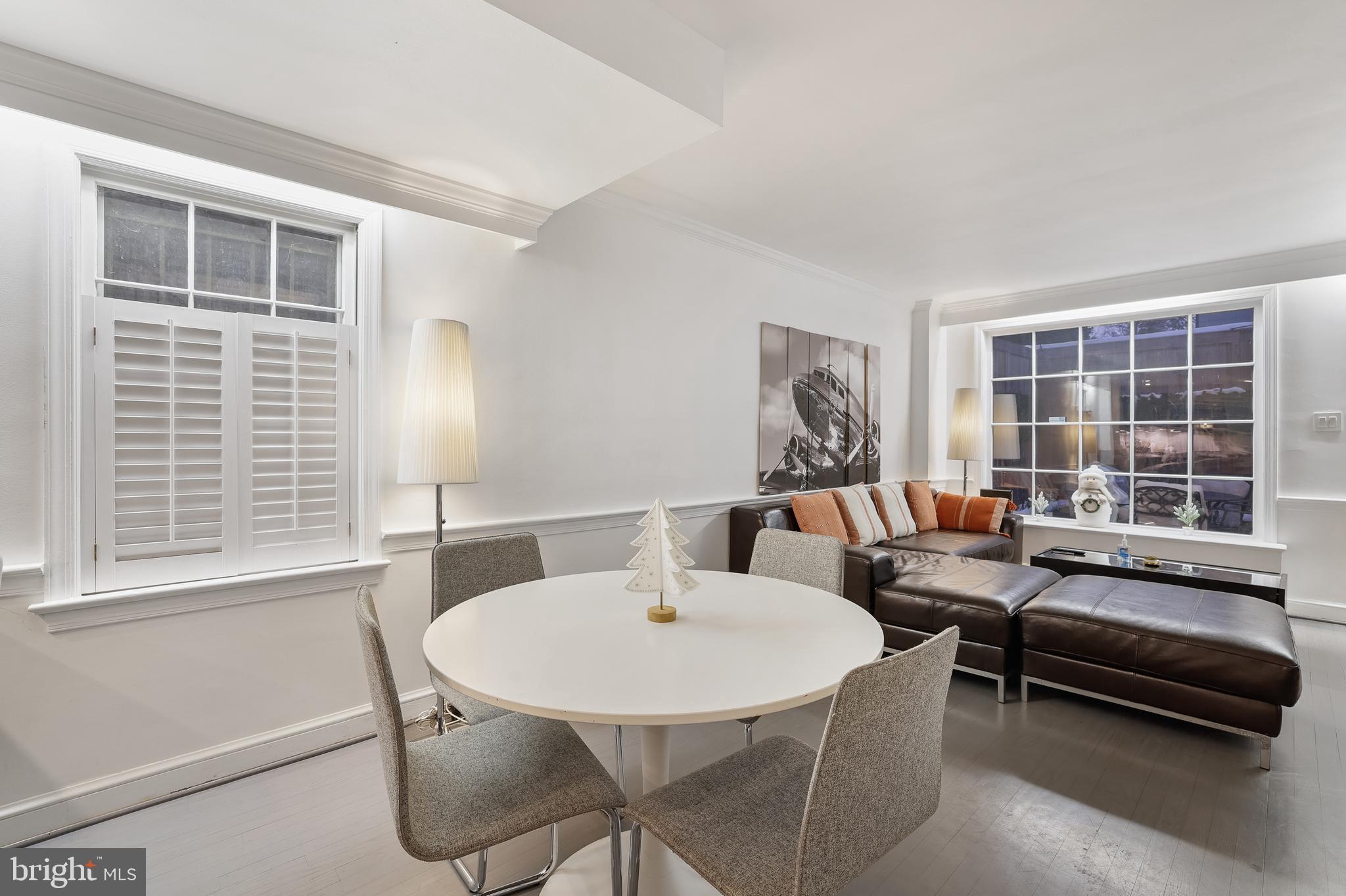 1233 Potomac Street Northwest Washington, DC 20007 - Photo 8 of 26 a bedroom with furniture and a window