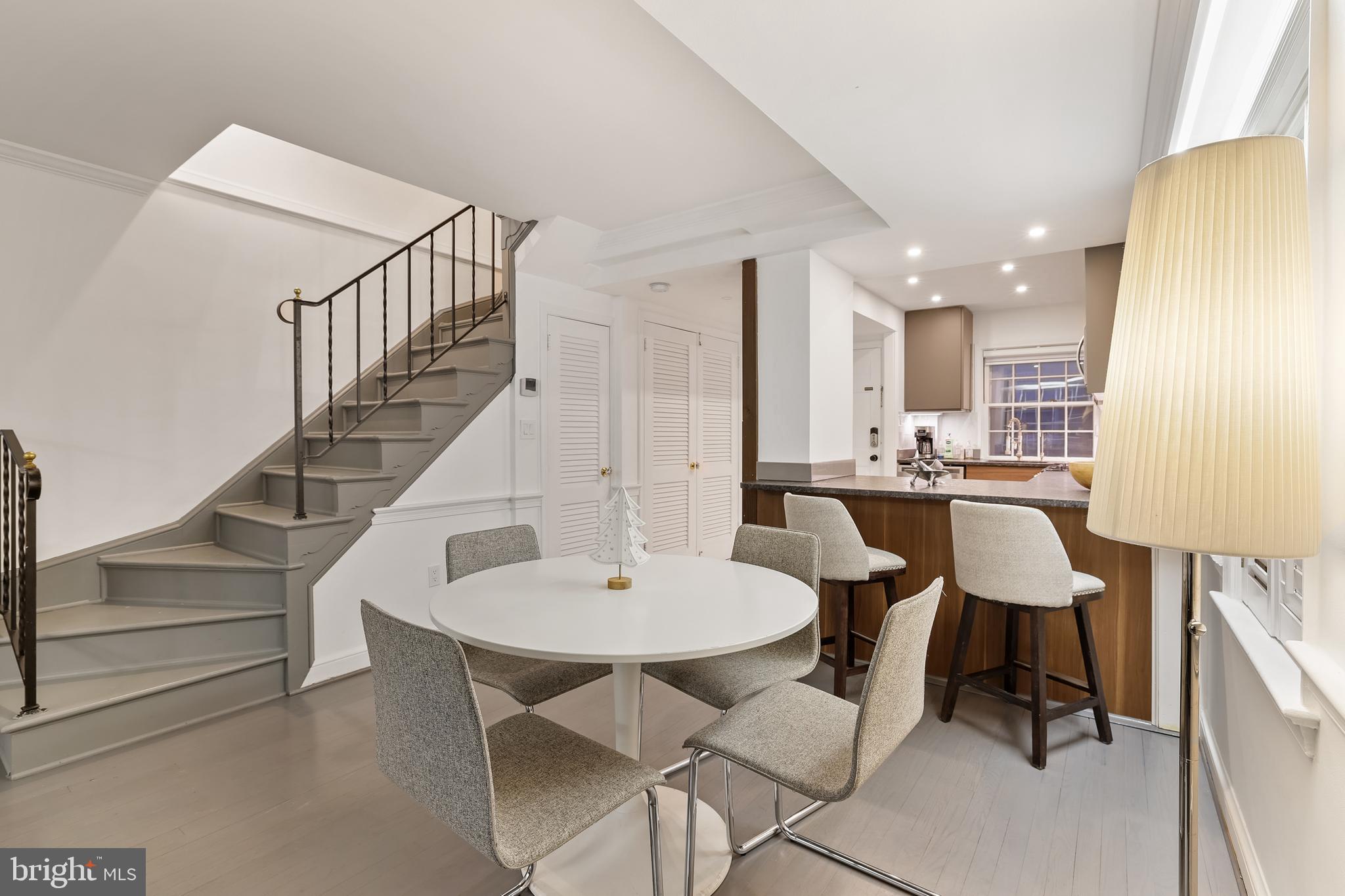 1233 Potomac Street Northwest Washington, DC 20007 - Photo 10 of 26 a dining room with furniture and entryway