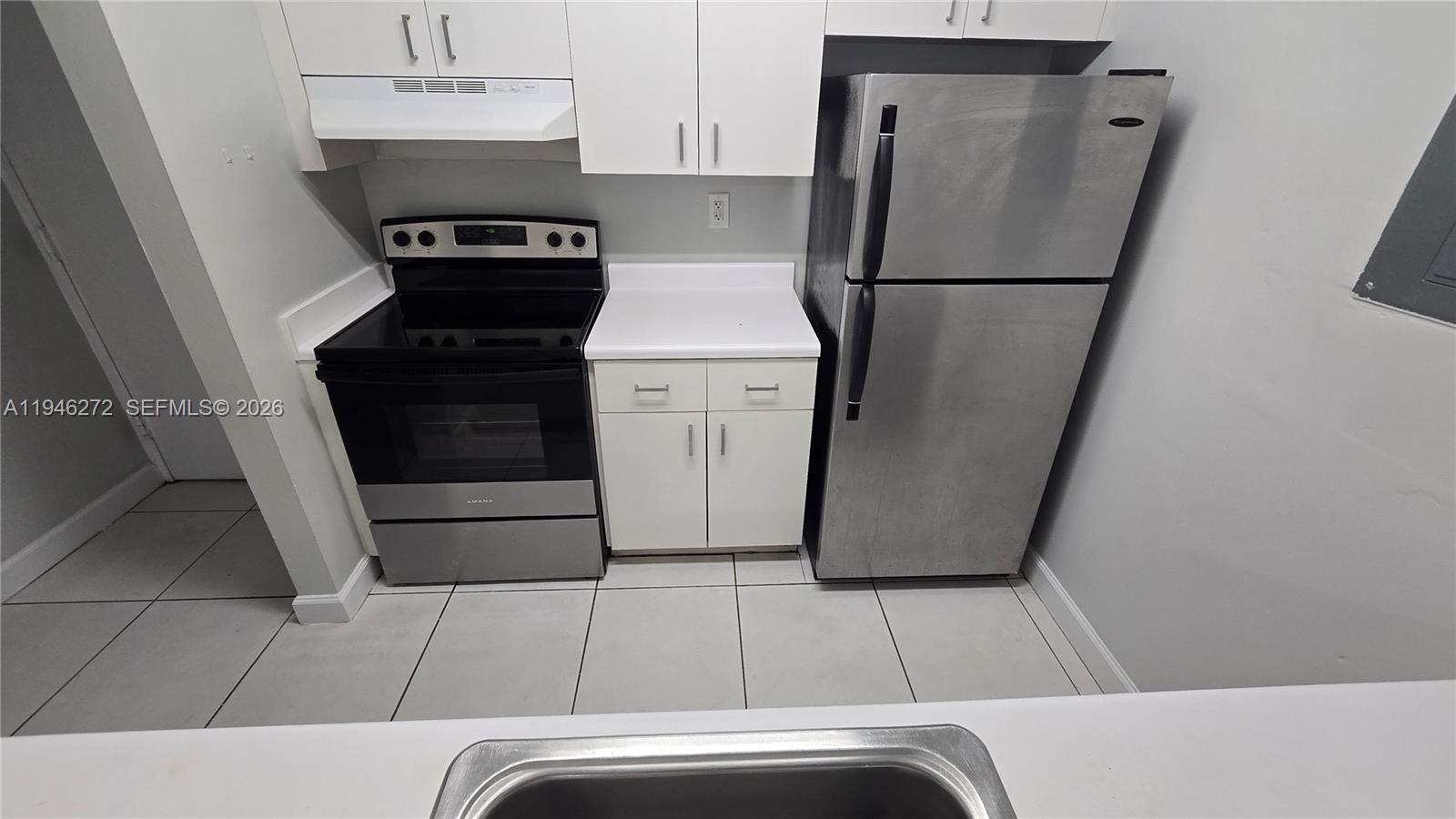 2150 Southwest 16th Avenue, Unit 206 Miami, FL 33145 - Photo 15 of 40 a utility room with dryer and washer