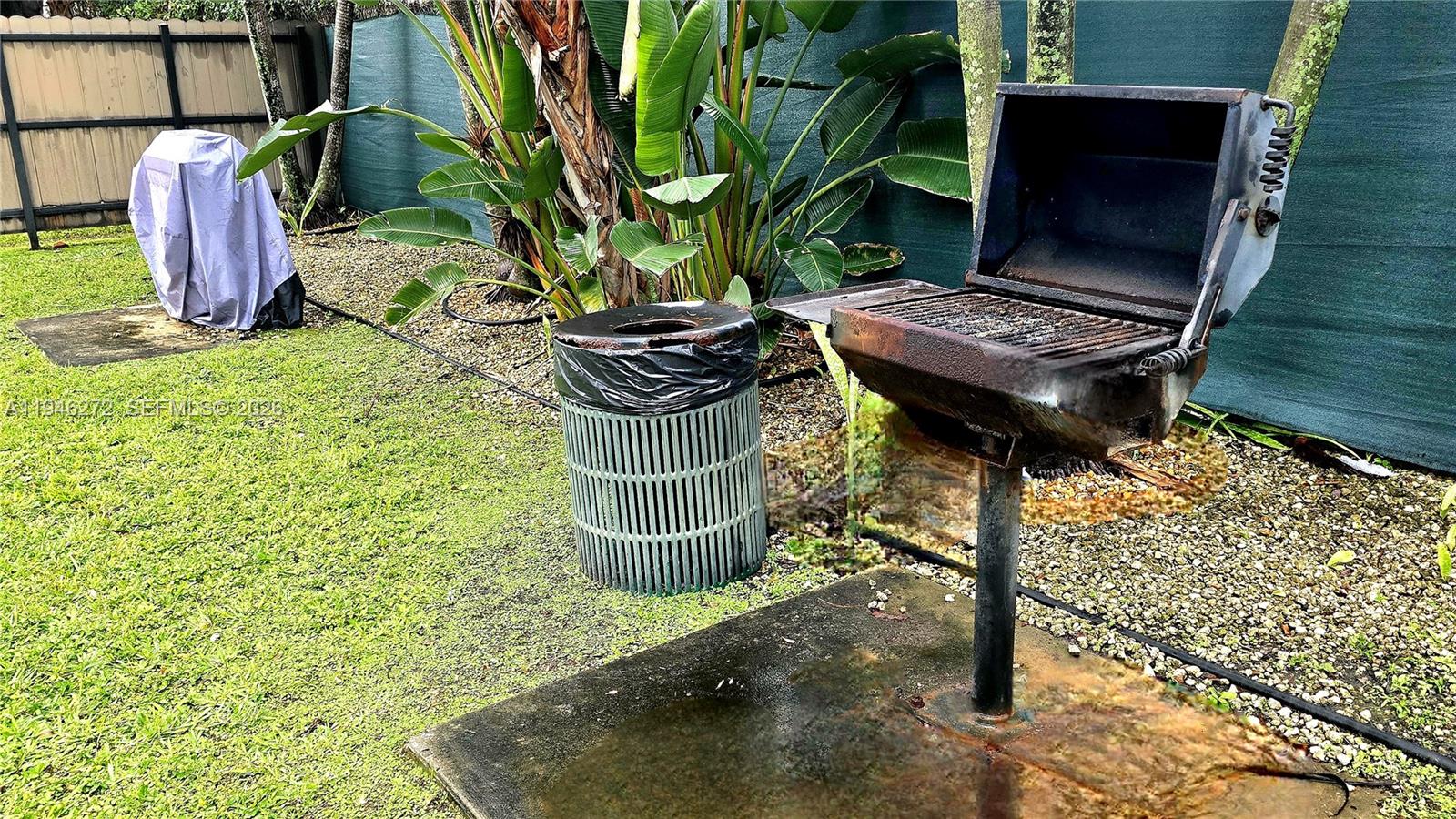 2150 Southwest 16th Avenue, Unit 206 Miami, FL 33145 - Photo 29 of 40 a view of a backyard with sitting area