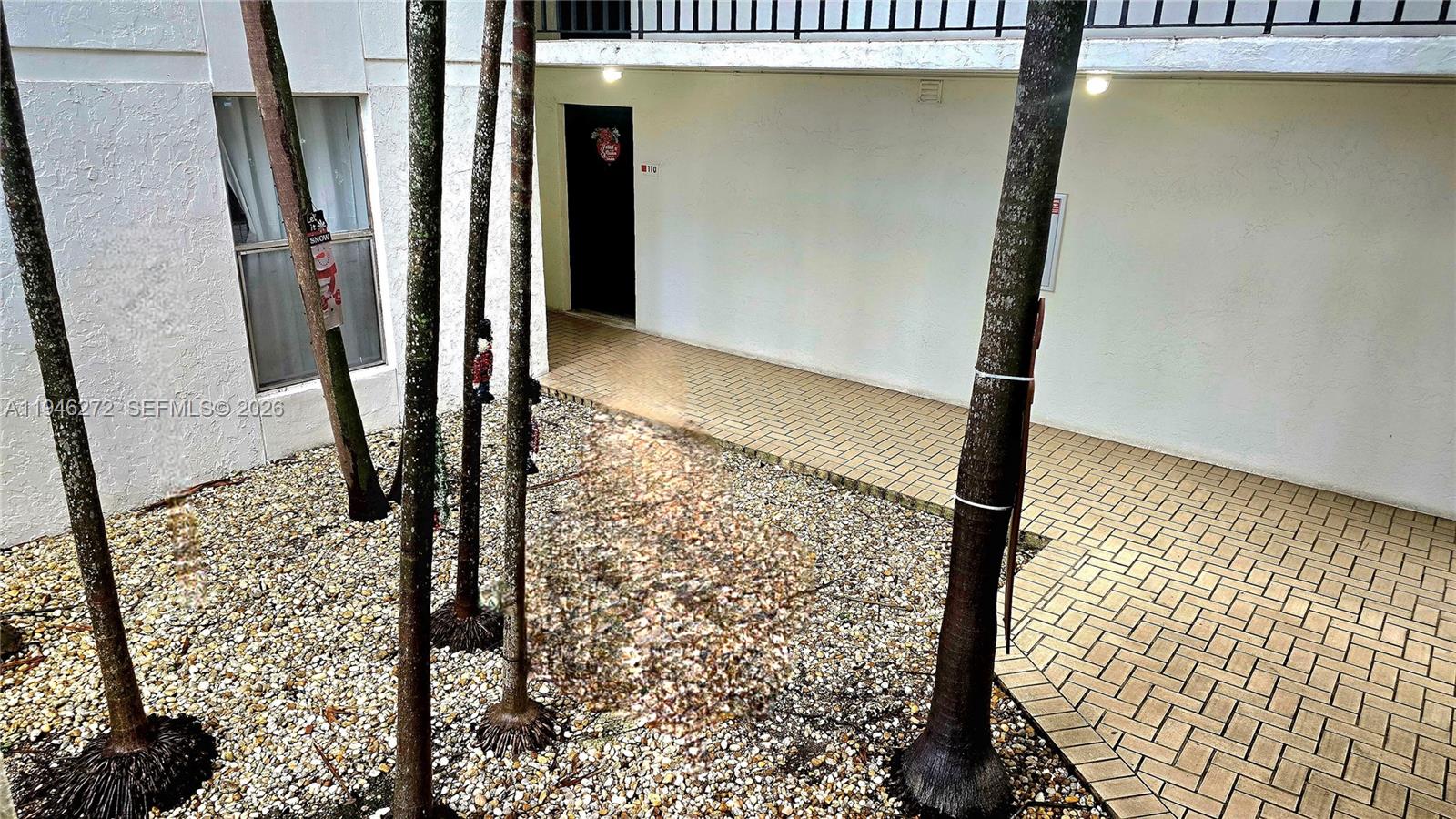 2150 Southwest 16th Avenue, Unit 206 Miami, FL 33145 - Photo 32 of 40 a view of a hallway