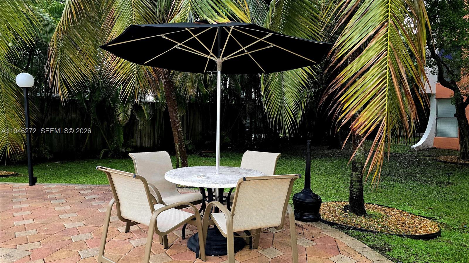 2150 Southwest 16th Avenue, Unit 206 Miami, FL 33145 - Photo 10 of 40 a view of outdoor space yard and patio