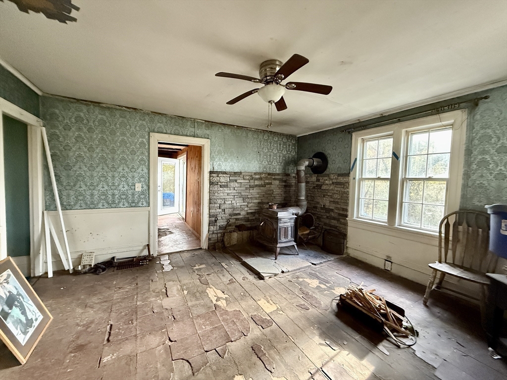 11 Danforth Park Road Framingham, MA 01701 - Photo 14 of 33 a living room with furniture gym equipment and a window