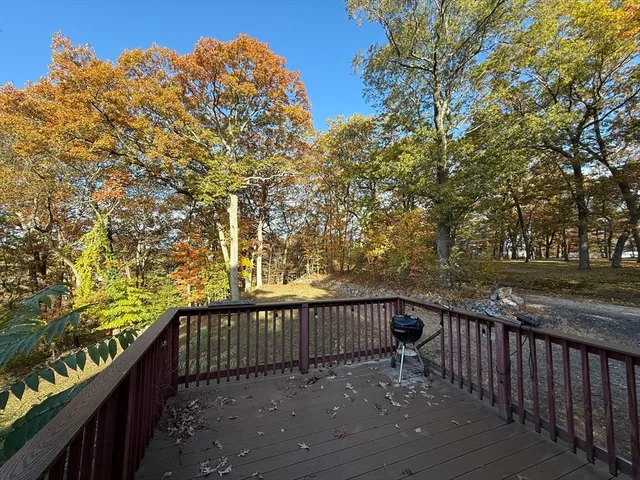 a bed room with furniture and a window