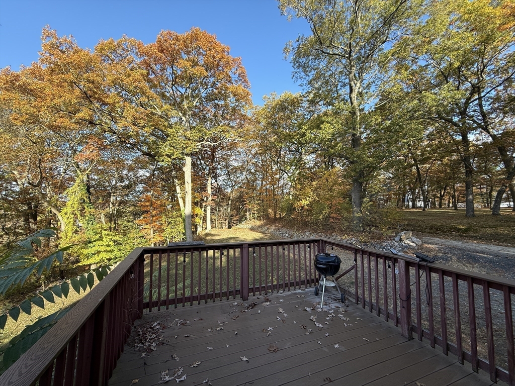 11 Danforth Park Road Framingham, MA 01701 - Photo 15 of 33 a balcony with wooden fence and trees