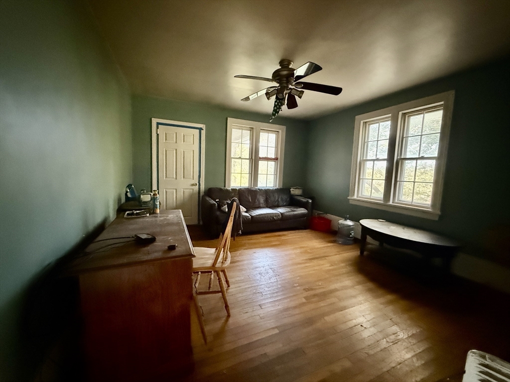 11 Danforth Park Road Framingham, MA 01701 - Photo 16 of 33 a living room with furniture and a window
