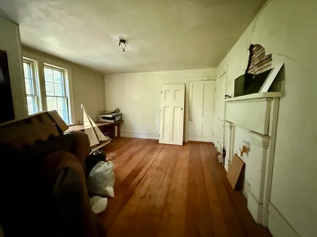 a kitchen with a stove and a table