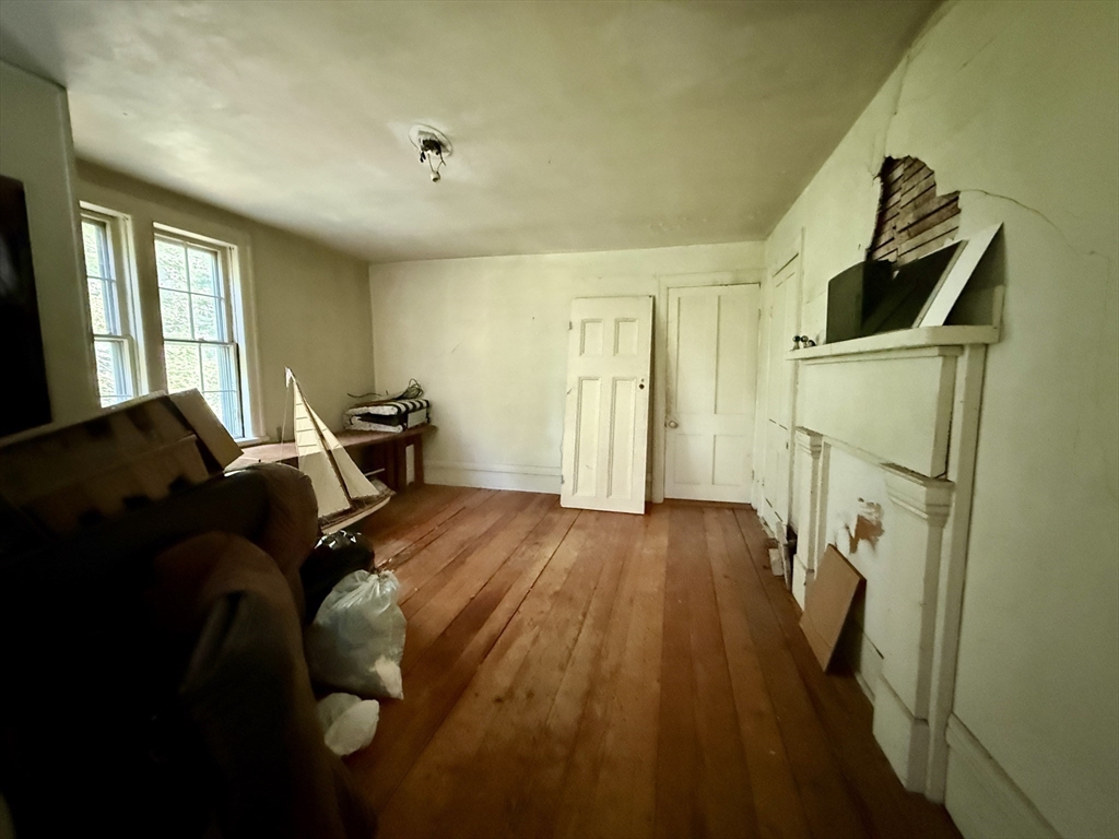 11 Danforth Park Road Framingham, MA 01701 - Photo 18 of 33 a bed room with furniture and a window