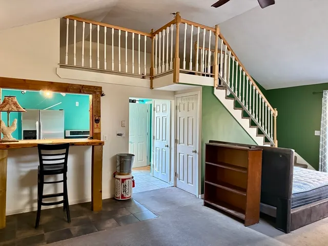 a view of entryway livingroom and hall