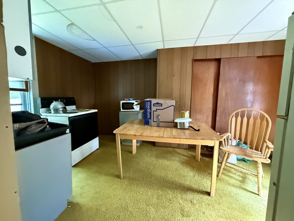 11 Danforth Park Road Framingham, MA 01701 - Photo 22 of 33 a kitchen with a stove and a table
