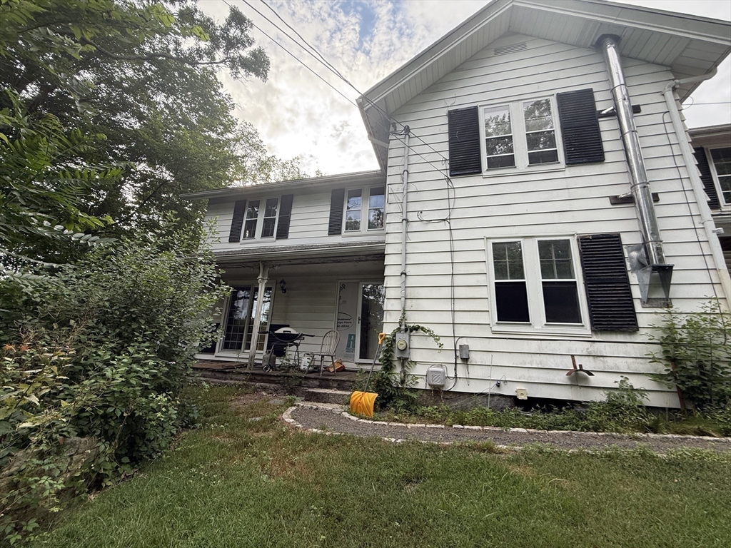 11 Danforth Park Road Framingham, MA 01701 - Photo 30 of 33 a front view of a house with garden