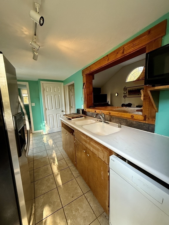 11 Danforth Park Road Framingham, MA 01701 - Photo 4 of 33 a spacious bathroom with a sink a large mirror and a shower