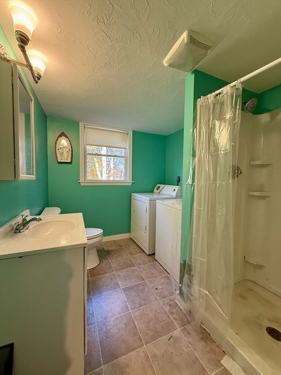 11 Danforth Park Road Framingham, MA 01701 - Photo 5 of 33 a room that has a sink and a mirror in it