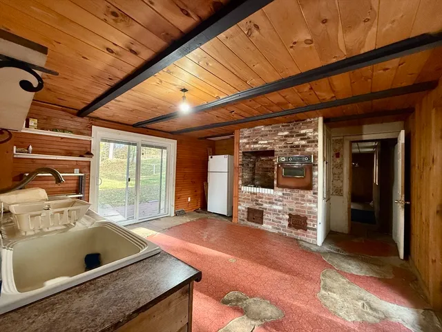 a room with furniture and a fireplace