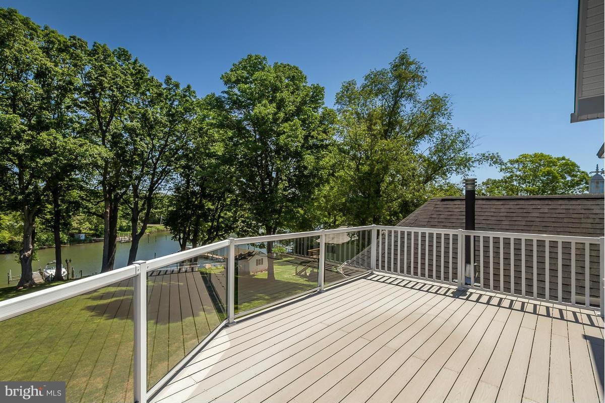345 Edgewater Road Pasadena, MD 21122 - Photo 23 of 30 Upper level deck overlooking lawn