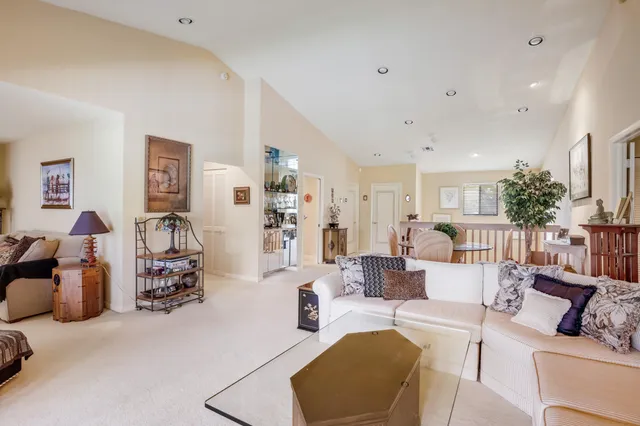 a living room with furniture or couch and a wooden floor