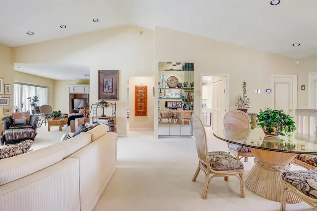 a view of a living room and dining room