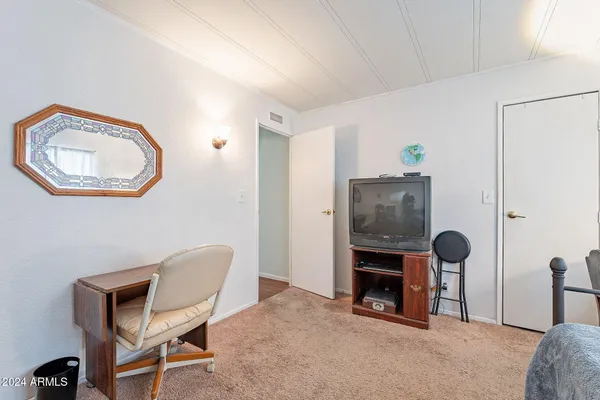 a room with furniture and a fireplace