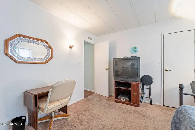 a room with furniture and a fireplace