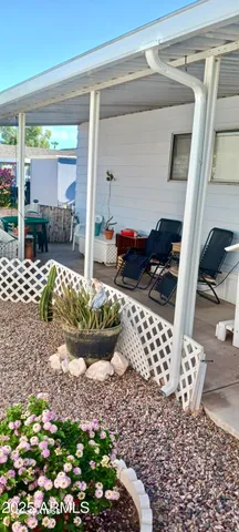 a room with lots of flowers and fruits